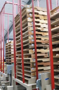 wooden pallets in the automatic pallet stacker
